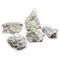 Five irregularly shaped Sunk Jade Rock metallic pieces with rough texture